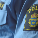 Närbild på en polisuniform